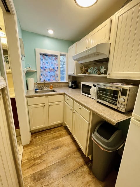 Kitchenette with microwave, coffee maker & large toaster oven/air fryer. 