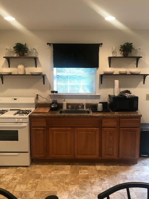 Spacious Kitchen With Shelving 