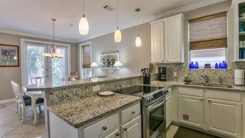 The kitchen is well-equipped, with all the amenities you would expect. 