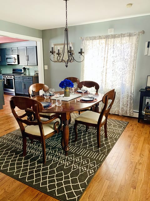 You are cordially invited to our classy Dining area w/ dimmable chandelier