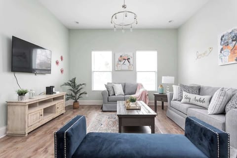 Our beautiful, spacious living room, complete with comfy furniture and HDTV, is the perfect place to gather and unwind!