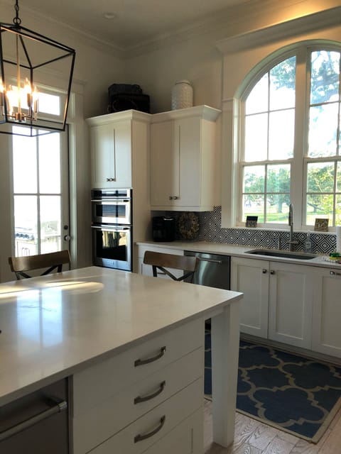 Kitchen with yard and beach view