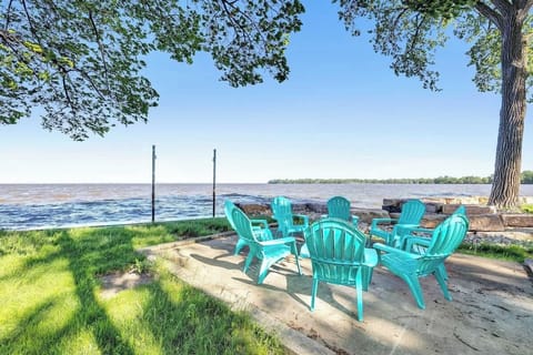 Fire pit with Adirondack chairs looking north toward Point Sable