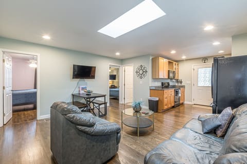 Lots of natural sunlight in the living room with skylight