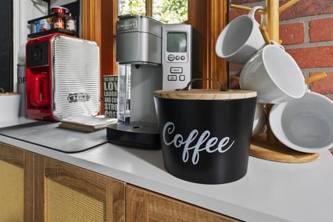 Coffee bar with Keurig, pot of coffee and k-cups and coffee and filters included