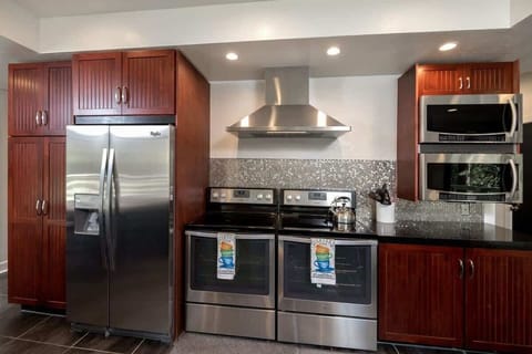 Dual Ovens and Microwaves. All new kitchenware.