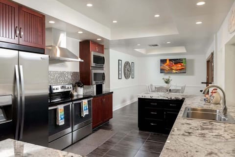 Stainless steel appliances. Sink views of Huge Pines