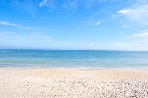 We have a private beach owned by our building100 feet from our condo door