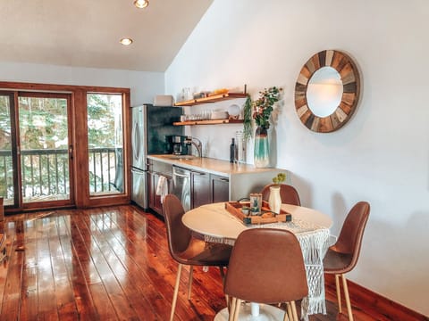 Open dining space & extra chairs can be added comfortably.