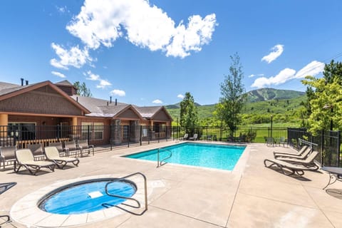 The community hot tub is open all year and it is just steps away from the home.