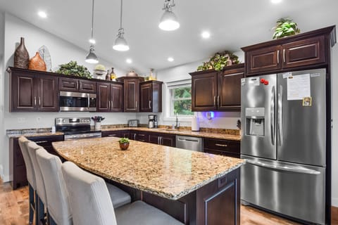 Kitchen island with stainless steel appliances