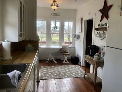 kitchen with breakfast table in entryway to enjoy the view of the river