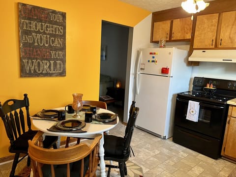 Stocked kitchen:
Pots/pans 
Blender 
Keurig 
Microwave
Dishes
Crockpot 
Toaster