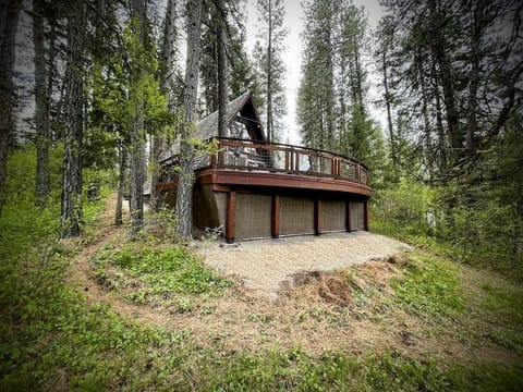 The deck is 7 feet above the ground and amongst the trees.
