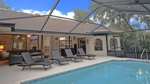 Private pool backing up to the woods