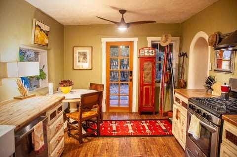 All new paint, floors, fan, cabinets, counters, skylight. Gas stove.