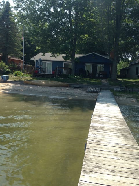 The Roman Cottage is behind this cottage and shares 65 ft of Lake frontage.