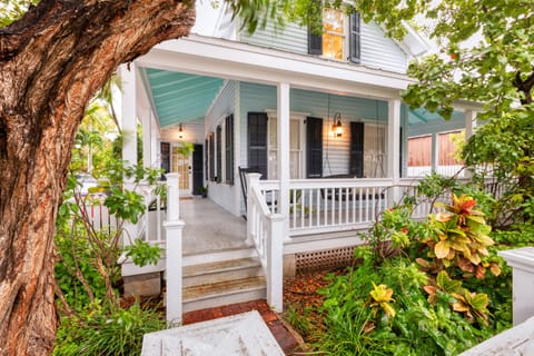 Lovely 1890's Key West Home with wrap-around porch and rooftop deck.  