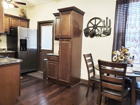 Indoor Garage entrance, pantry, dinning. Shared Laundry located in Garage.