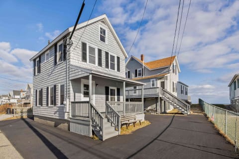 Your lodging in the front house. 30 second walk to beach at end of fence.