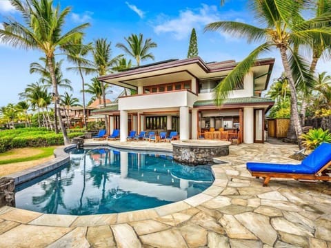 This luxury, 2-story oceanfront estate on Big Island boasts one of the best locations on the entire Kona coast.