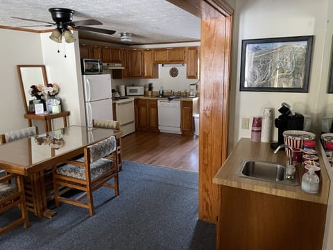Full Kitchen (Dishwasher, Disposal, Stove, Microwave, Fridge, and Cookware