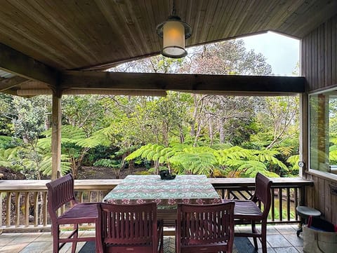 Maile Treehouse Lanai - Relax on the lanai and enjoy the misty volcano landscape