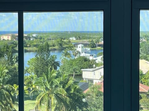 View from screened in balcony- can see bay and beautiful sunsets