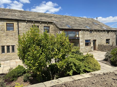 Rear south facing patio area of High Gate and Threshings 