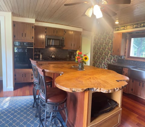 handcrafted island gives the room character