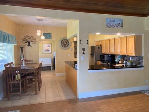 Open concept living, dining, kitchen area.