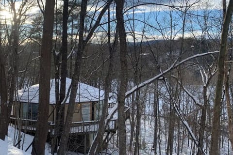 Beautiful snow covered, cabin....