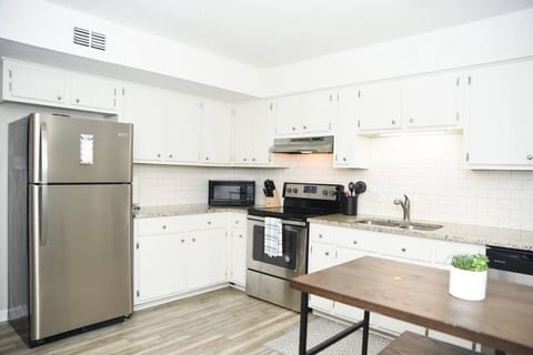 Stainless steel appliances and granite counter tops