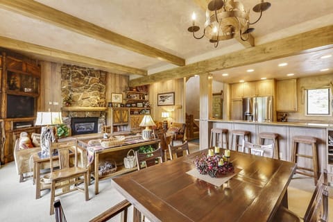 Our cozy yet spacious Living and Dining Area is where comfort meets rustic charm.