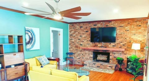 Large front Living room with 2 additional seating areas.