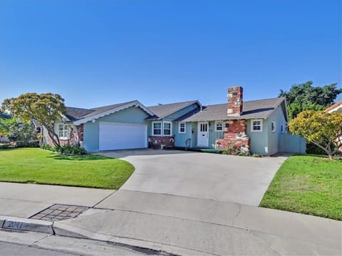 two car attached garage with extended driveway that can park an additonal 3 cars