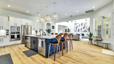 Whip up your favorite meal in the kitchen which boasts high end stainless steel appliances 