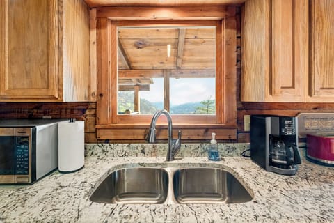 You can take in our gorgeous views everywhere, even while washing the dishes!