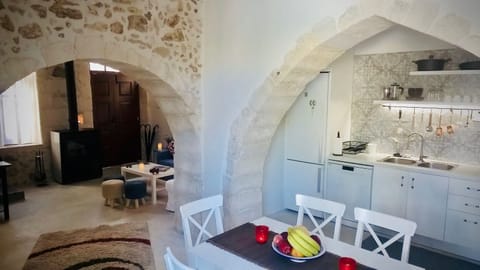 Dining area. Open plan kitchen and dining area with expandable dining table