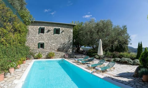 External view of the building. the Old House & the private pool