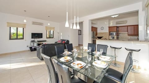 Dining area with table and chairs to seat 8