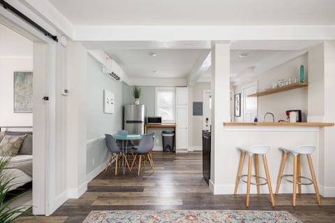 Spacious open-concept layout w/ breakfast bar seating & seamless flow into the kitchen.