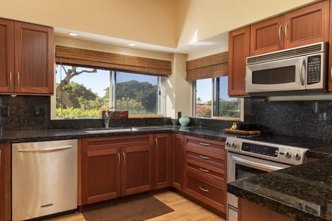 Kitchen equipped with all major appliances.