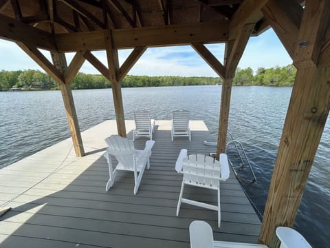 Covered portion of dock for shade and easy step angled ladder for easy in/out 