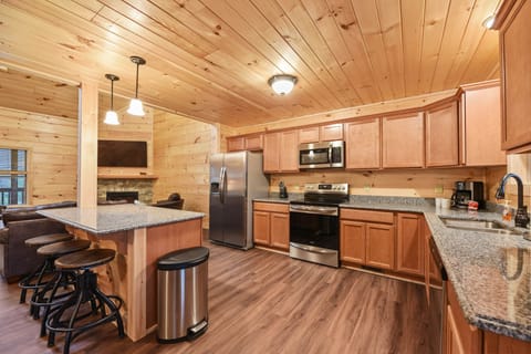Plenty of space to cook a special meal, or unpack take out.  3 stools at island.