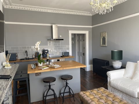 Living room with open plan kitchen