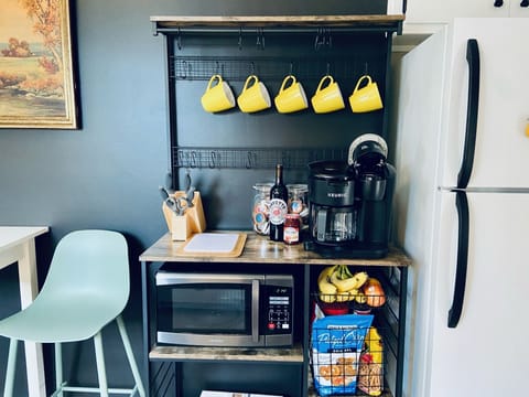 Kitchen rack with dual coffee maker (Keurig and filter brew), microwave, etc.