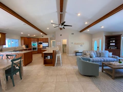 Step into Comfort: Feel the Warmth of Welcome as You Enter Our Inviting Living Room