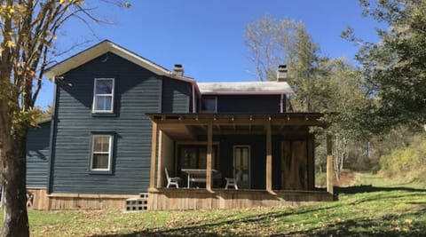Farmhouse with porch/BBQ sofa and table