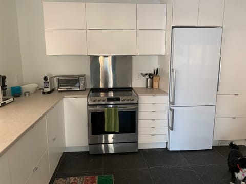 The kitchen features an efficient convection stove.